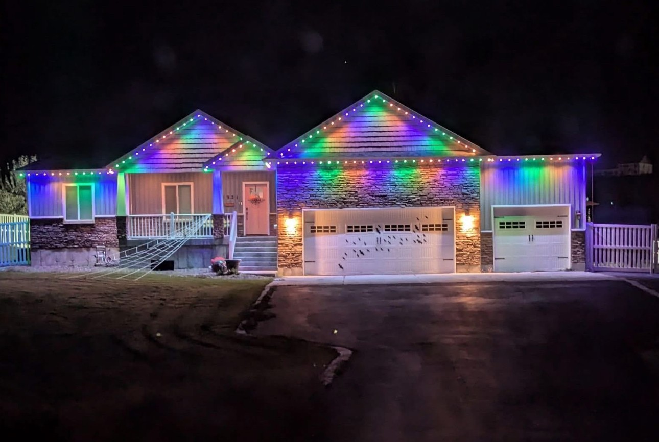 Permanent lighting on home eaves at night