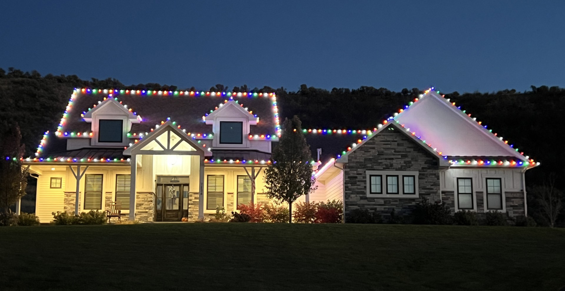 Idaho home with professionally installed multi-color C9 Christmas lights